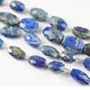 Beads, Lapis (natural), 17-20mm hand-cut faceted Oval Tumble  C grade, Mohs hardness 5-6. Sold per 7 Inches strand Royal Blue color beads. Lapis lazuli is a deep blue with a touch of purple and flecks of iron pyrite. Lapis consists of Lapis (blue, calcite (white streaks) and silver flakes of pyrite. Deep blue color gemstones are of best kind. 